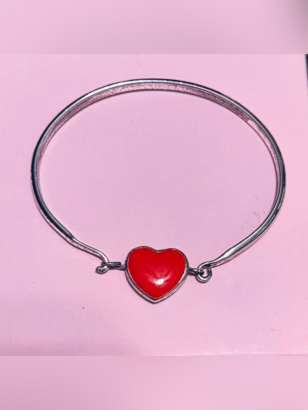 Red Coral on-one side and the other celtic  design. classy fun bangle